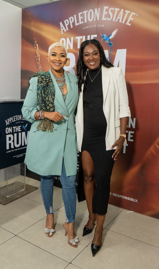 From Left: Media personality Debbie Bissoon (Host) and Michelle-Ann Letman, Chief Executive Officer (CEO) of PR Belle Media, smile brightly for the camera